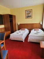 Posteľ alebo postele v izbe v ubytovaní Virgo B&B Biznes Rumia