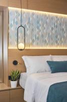 Posteľ alebo postele v izbe v ubytovaní 7Rizes Luxury Living