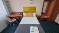 Posteľ alebo postele v izbe v ubytovaní Carina Hotel