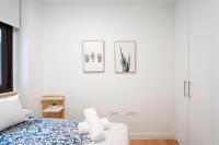 A bed or beds in a room at Plaza Nueva HOMES