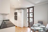 A kitchen or kitchenette at Plaza Nueva HOMES