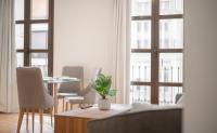 A seating area at Plaza Nueva HOMES