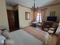 Postel nebo postele na pokoji v ubytování Hotel Rural Ovio