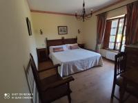 Postel nebo postele na pokoji v ubytování Hotel Rural Ovio
