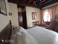 Postel nebo postele na pokoji v ubytování Hotel Rural Ovio
