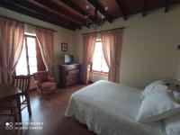 Postel nebo postele na pokoji v ubytování Hotel Rural Ovio