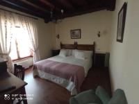 Postel nebo postele na pokoji v ubytování Hotel Rural Ovio
