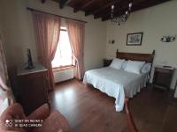 Postel nebo postele na pokoji v ubytování Hotel Rural Ovio