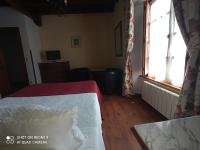 Postel nebo postele na pokoji v ubytování Hotel Rural Ovio