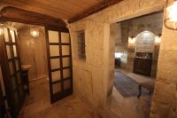 Postel nebo postele na pokoji v ubytování Ürgüp Cave Suites