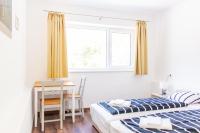 Posteľ alebo postele v izbe v ubytovaní Wesselényi Strand apartmanok