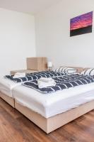 Posteľ alebo postele v izbe v ubytovaní Wesselényi Strand apartmanok