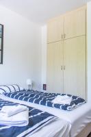 Posteľ alebo postele v izbe v ubytovaní Wesselényi Strand apartmanok