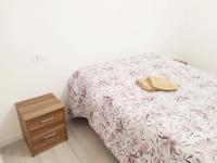 Posteľ alebo postele v izbe v ubytovaní Levico Al Corso Apartments