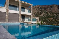The swimming pool at or close to Red Rock villa, Plaka Elounda