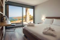 A bed or beds in a room at Red Rock villa, Plaka Elounda
