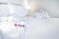 A bed or beds in a room at Red Rock villa, Plaka Elounda