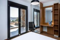A bed or beds in a room at Red Rock villa, Plaka Elounda