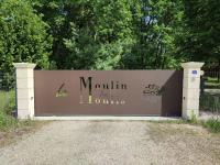 a sign for a mountain institution of lollips at Chambre d&#39;hôtes Le Moulin de Moulis in Moulis-en-Médoc