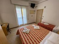 Posteľ alebo postele v izbe v ubytovaní Hotel Nanni Garnì