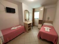 Posteľ alebo postele v izbe v ubytovaní Hotel Nanni Garnì