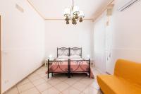 A bed or beds in a room at Paco House