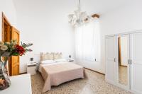 A bed or beds in a room at Paco House