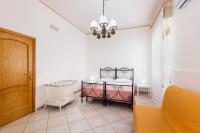 A bed or beds in a room at Paco House