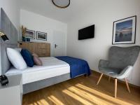 Posteľ alebo postele v izbe v ubytovaní P&A APARTAMENT