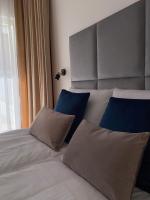 Posteľ alebo postele v izbe v ubytovaní P&A APARTAMENT