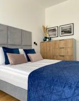 Posteľ alebo postele v izbe v ubytovaní P&A APARTAMENT