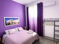 Posteľ alebo postele v izbe v ubytovaní appartamento sul corso (Ortigia)