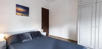 Posteľ alebo postele v izbe v ubytovaní Kamelia Apartment