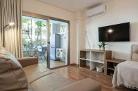 TV a/nebo společenská místnost v ubytování Apartamentos Salou - 111