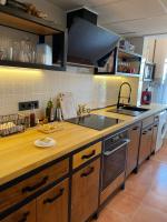 A kitchen or kitchenette at Los Nietos Apartment