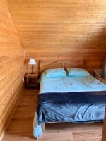 Łóżko lub łóżka w pokoju w obiekcie Chalet cosy au cœur du Dévoluy avec vue magnifique