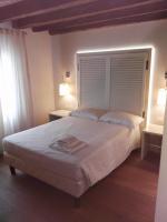 Postel nebo postele na pokoji v ubytování Agriturismo Villa Trovatore