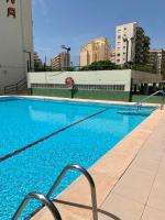Bazén v ubytovaní Ático COPACABANA FAMILIAS alebo v jeho blízkosti