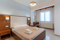Posteľ alebo postele v izbe v ubytovaní Villa Aretousa 2