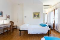 Posteľ alebo postele v izbe v ubytovaní Del Corso Apartment