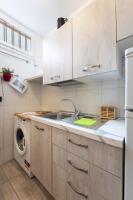 Kuchyňa alebo kuchynka v ubytovaní Del Corso Apartment