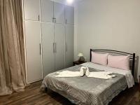 Postel nebo postele na pokoji v ubytování A&D City Apartment