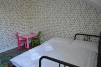 A bed or beds in a room at Ager Apartments