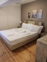 Posteľ alebo postele v izbe v ubytovaní Astradeni luxury apartments Kratir