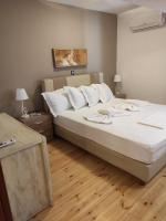Posteľ alebo postele v izbe v ubytovaní Astradeni luxury apartments Kratir