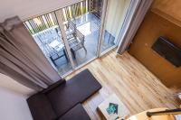 Televízia a/alebo spoločenská miestnosť v ubytovaní Natura Resort
