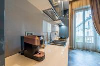 Kuchyňa alebo kuchynka v ubytovaní Plaza View Luxury Apartment, Alba