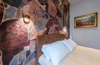 Posteľ alebo postele v izbe v ubytovaní Plaza View Luxury Apartment, Alba