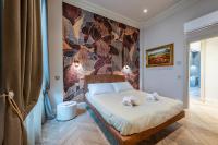 Posteľ alebo postele v izbe v ubytovaní Plaza View Luxury Apartment, Alba