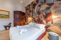 Posteľ alebo postele v izbe v ubytovaní Plaza View Luxury Apartment, Alba